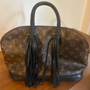 Louis Vuitton Brown Monogram Shoulder Bag with Black Accents.
